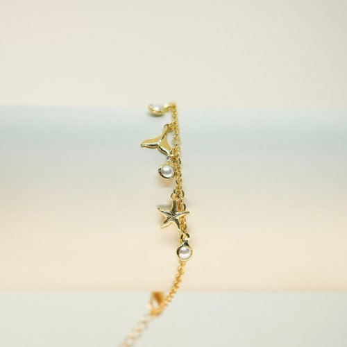 PULSERA LISA PERLITAS CON BAÑO DE ORO