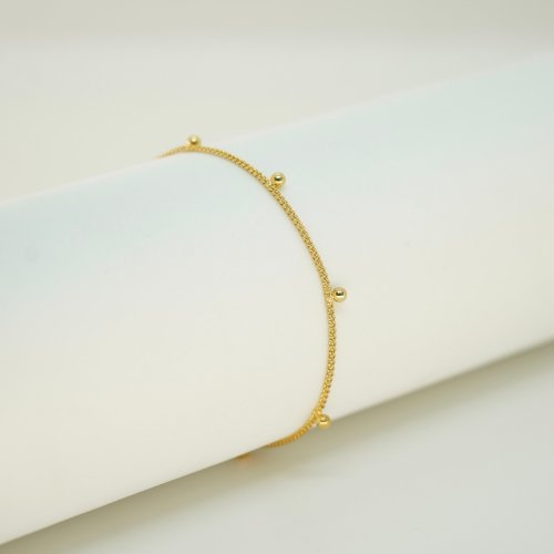 PULSERA LISA DE BOLITAS CON BAÑO DE ORO