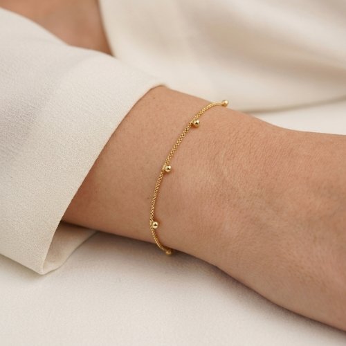 PULSERA LISA DE BOLITAS CON BAÑO DE ORO