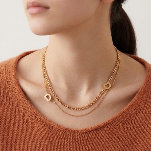 COLLAR DOBLE LETRA CON BAÑO DE ORO